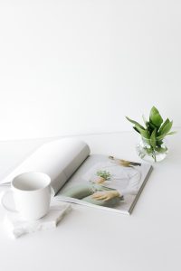 lifestyle pr agency magazine plant white mug white table